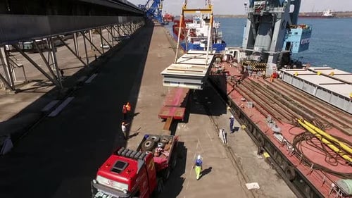 Ukraine May 2016 Workers Reload Oversized Cargo From Ship to Long Transport Car