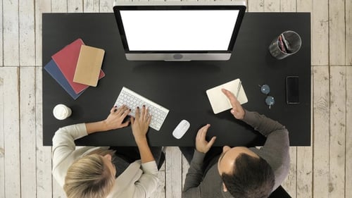 Team Collaboration at Desk, Overhead Shot