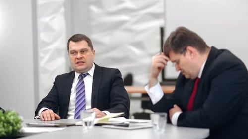Annoyed Businessman in Suit Yelling to Man Employee Dissatisfied Working