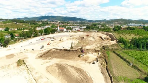 Heavy Machinery at Construction Site Aerial View