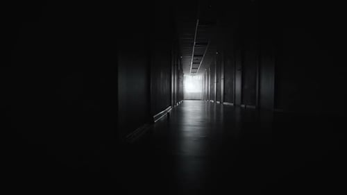 Eerie Dark Corridor Lit at the End