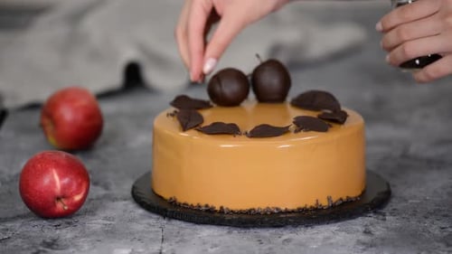 Pastry Chef Decorating the Mousse Cake with Small Chocolate Pieces, Pastry Chef Decorated Modern