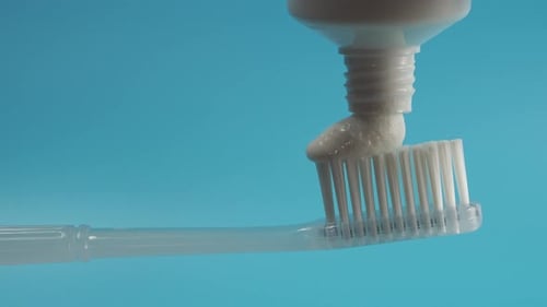 Toothpaste is Applied to the Toothbrush