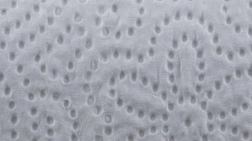 White Textured Surface with Repeating Dimples