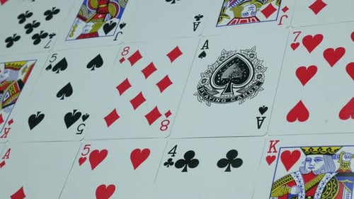 Playing Cards Arranged on a Flat Surface