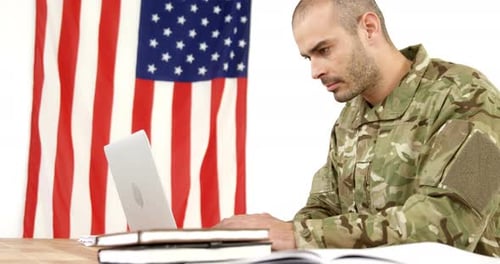 Soldier using laptop