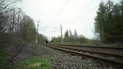 Vintage Steam Train Passing Through Rural Nature