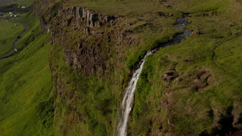 Orbit Overhead Drone View of Majestic Seljalandsfoss Waterfall in Iceland Most Famous Travel
