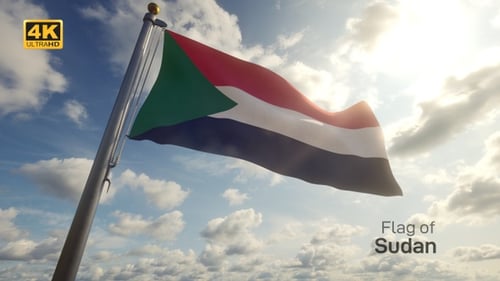 Sudan Flag Waving in the Wind with Sunny Sky Background