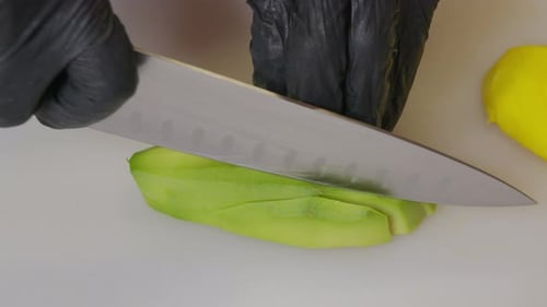 Avocado Sliced Thinly on Cutting Board