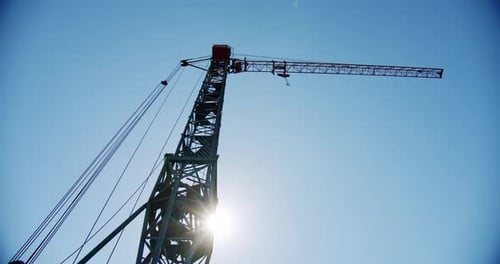 Crane Rotate at Building Construction Site, Architecture Apartments. Wide Shot V4