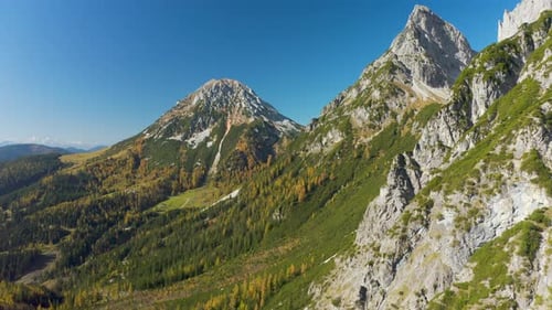 4K Aerial View on Sunny Autumn Day in Mountain Landscape