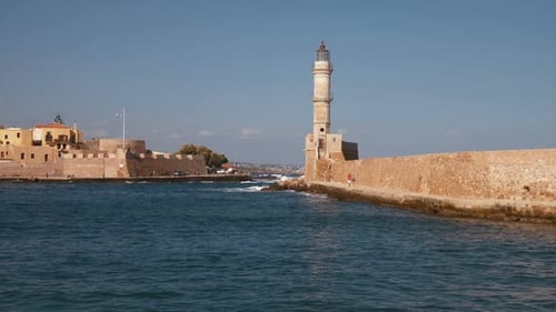 Scenic Lighthouse on Coastal Pier on Clear Day