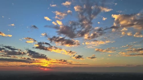 Aerial View of Sunrise with Vibrant Clouds