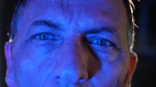 Extreme Close Up of Face with Flashing Lights