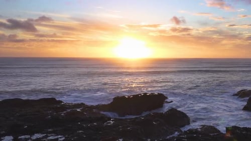 Sunset over Sea Waves