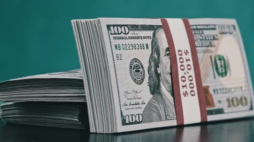 Stacks of Hundred Dollar Bills Close Up