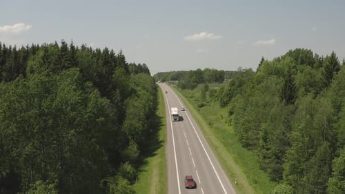 Truck Driving On The Road During Summer Day