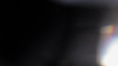 Multicolored Light Leaks Footage on Black Background Stylizing Video Transitions Bokeh Effect