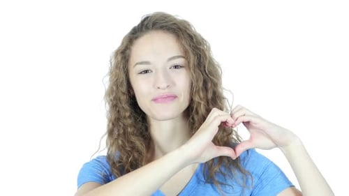 Woman Making Heart Shape With Hands