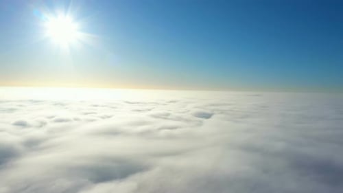 Aerial View of Clouds in a Blue Sky