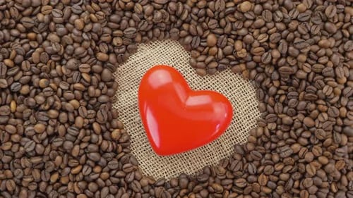 Red Heart on Burlap Surrounded by Coffee Beans
