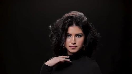 Beautiful Girl Looking at Camera in Studio