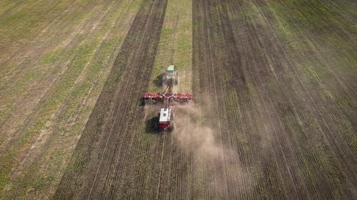 Aerial View of Tractor Plowing Field for Agriculture