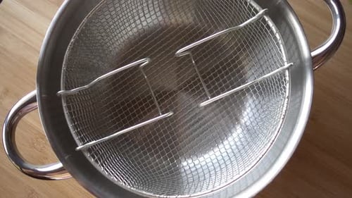 Shiny Metal Cooking Pot with Frying Basket