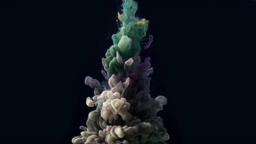 Colorful Ink Flowing Gracefully in Dark Water