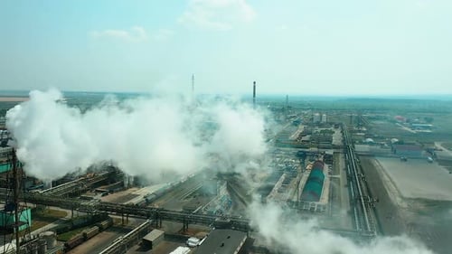 Smoke From the Chimneys of the Plant, Air and Environmental Pollution. Huge Territory of the Plant