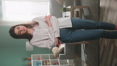 Young Woman Poses in Living Room