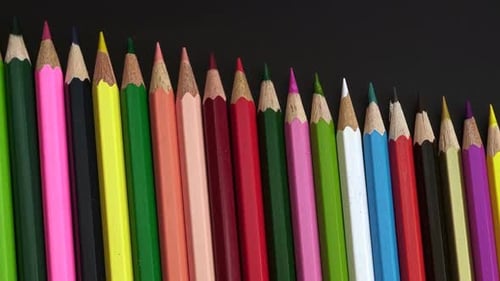 Colored Pencils On A Black Background 1.