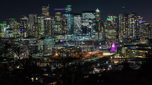 Bright City Skyline Building Lights Timelapse Zoom Out Night Background