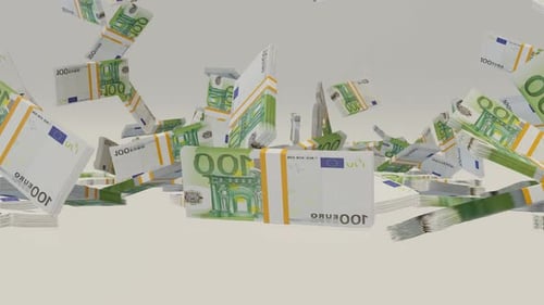 Many wads of money falling on table. 100 Euro banknotes.