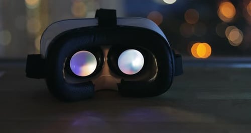 Virtual Reality Headset Glowing at Night