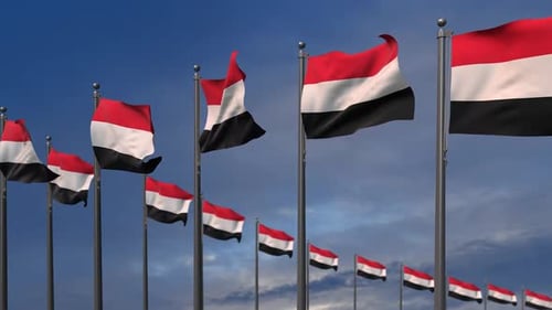 Looping Yemen Flags Waving In Blue Sky