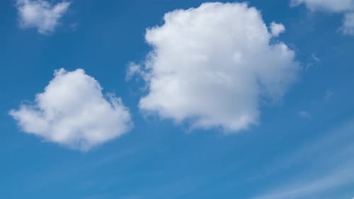 Fluffy White Clouds Moving Fast in Time-lapse. Daylight, Cloudy Heaven Background. Timelapse of