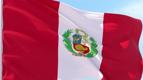 Peruvian Flag Waving Seamlessly Against a Clear Blue Sky