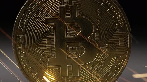 Cryptocurrency on the block chain - close up of bitcoin altcoin physical coins in dynamic setting