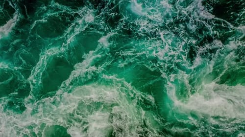 Waves of Water of the River and the Sea Meet Each Other During High Tide and Low Tide