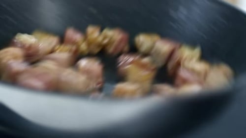 Bacon Cooking in Frying Pan on Stove