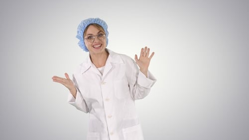 Woman in Lab Coat Talking and Gesturing