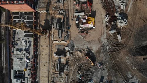 Drone Flying Over a Construction Site with a Top Down View. The Camera Flies Superstructure, Top