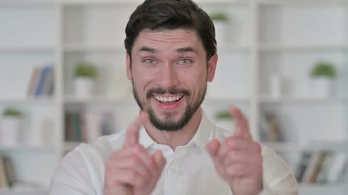 Man Pointing Finger and Inviting