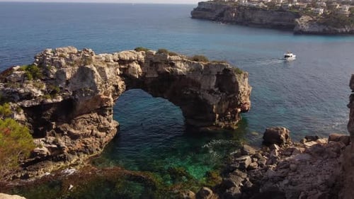 Es Pontas Natural Stone Arch in Cala Santanyi in Mallorca or Majorca, Spain