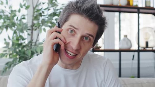 Portrait of Angry Caucasian Millennial Man Wearing White Tshirt Frustrated Mad Furious Emotional