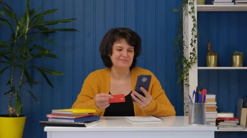 Woman Shopping Online with Phone and Card