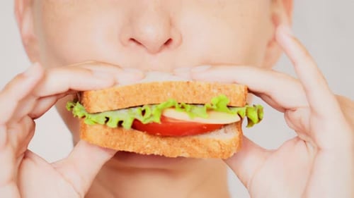 Close Up Face Young Woman Eating Lunch