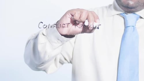 Writing Conflict Resolution on Clear Surface